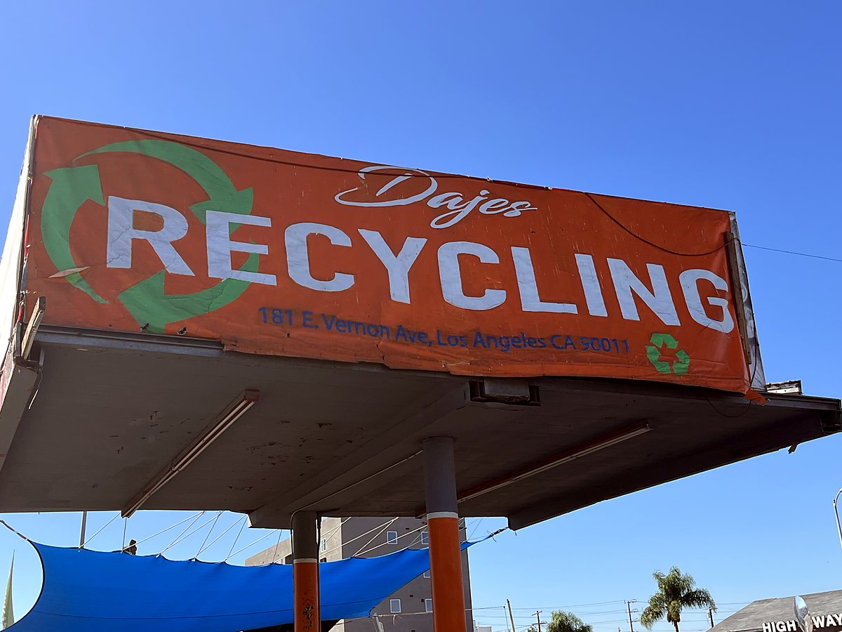 The big red Dajes RECYCLING banner with the address, 181 E Vernon Ave